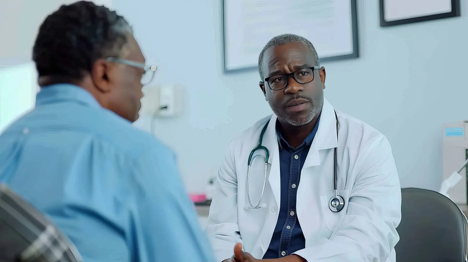 HIV patient consulting a male doctor in clinic
